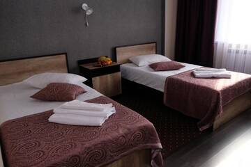 Двухместный номер с 2 отдельными кроватями и душем в Отеле ORIENT